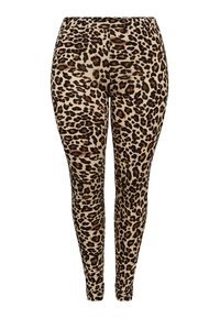 Leggings en imprimé léopard avec une base beige et des taches noir-brun, dotés d'une taille élastique et d'un design près du corps.