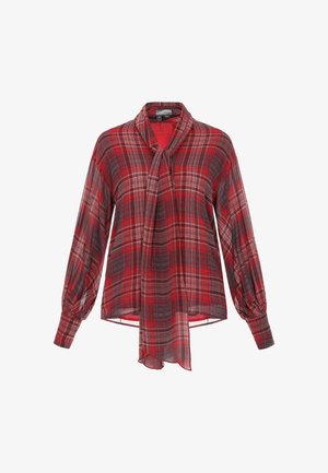 Czerwona kraciasta bluzka z wiązanym kołnierzem, długimi rękawami w kształcie balonu oraz luźnym krojem. Tkanina ma do siebie kratkę w różnych odcieniach czerwieni i szarości.
