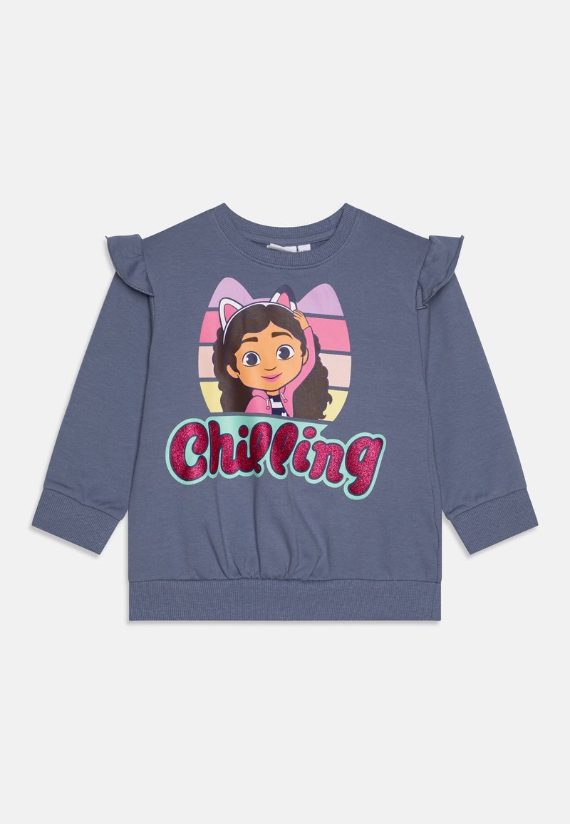 Sweat-shirt bleu à manches longues pour enfants avec épaules à volants, avec une fille cartoon aux oreilles de chat et « Chilling » écrit en lettres roses pailletées.