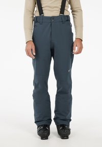 Mannelijke blauwe skibroeken met verstelbare zwarte bretels, een hoog elastische taille en verstevigde kniestukken. Knopen- en ritsluiting.