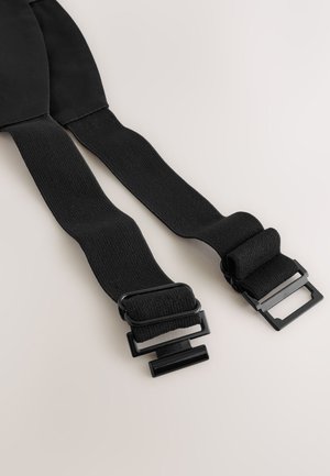 Tirantes ajustables negros con correas elásticas, que cuentan con clips metálicos mate negros y un diseño minimalista. La superficie texturizada añade agarre.