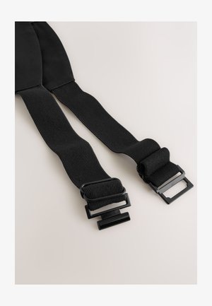 Crne podesive tregeri s elastičnim trakama, s mat crnim metalnim kopčama i minimalističkim dizajnom. Teksturirana površina pruža bolje prianjanje.