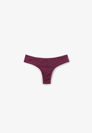 Burgundy lace thong featuring floral patterns, a smooth waistband, and delicate scalloped trim along the edges.