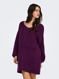Oversized purple knit sweater dress with a wide neckline and long sleeves, featuring a textured fabric and a straight hem.