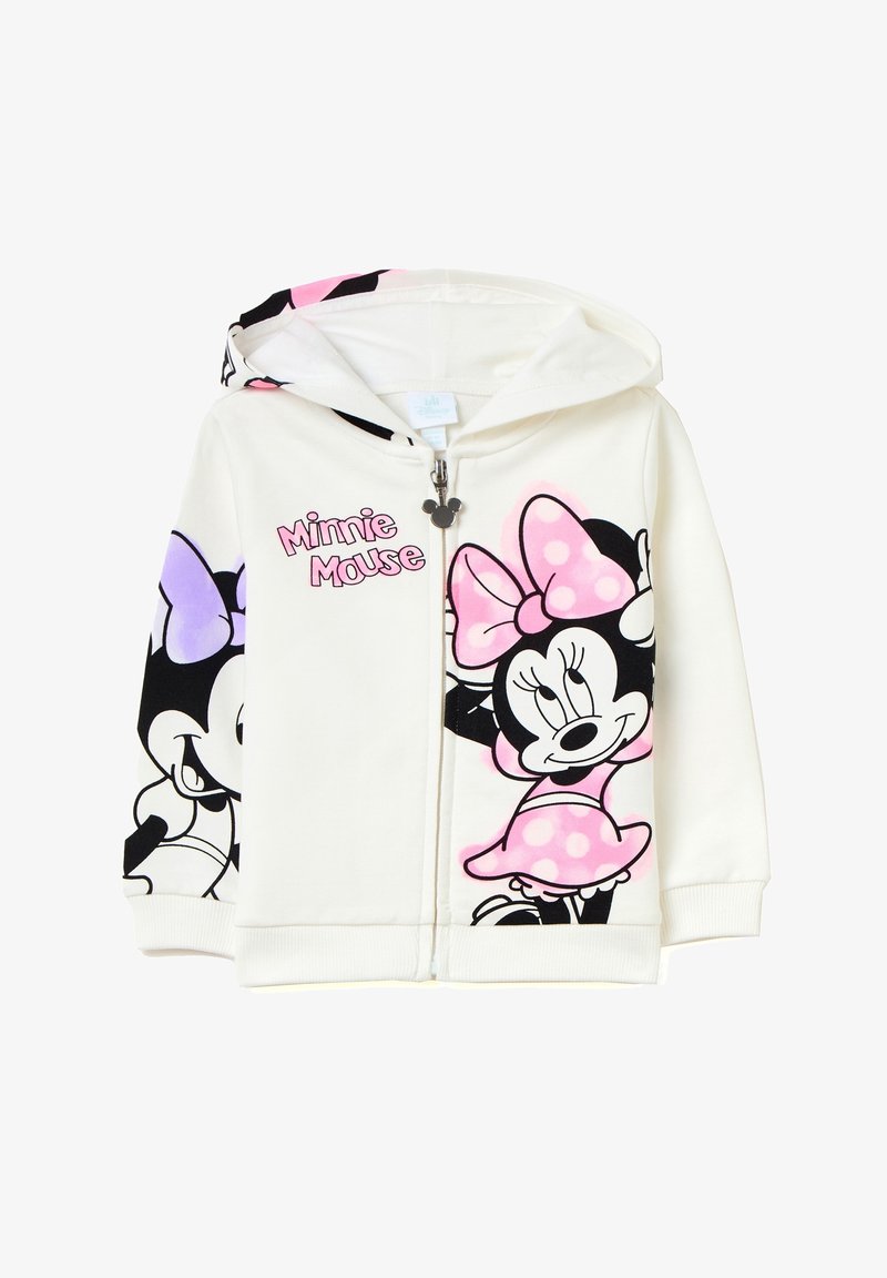 Sweat à capuche zippé blanc pour enfants avec grande impression de Minnie Mouse portant un nœud et une robe rose à pois, et texte "Minnie Mouse" rose sur le devant.