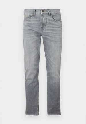 Hallid teksad sirgjoonelise lõikega, mis on varustatud viie tasku, nööpkinnituse ja tagasihoidliku pleekimisega.