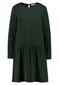 Vestido verde con mangas largas, cuello redondo y detalle de llave en la espalda. Presenta una cintura fruncida y lunares blancos en toda su superficie.
