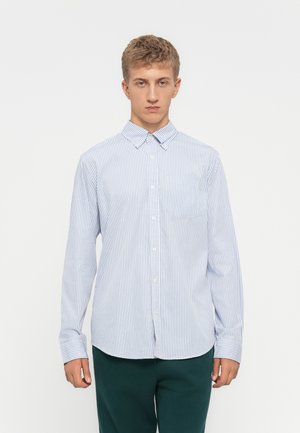 Button-up shirt featuring light blue and white vertical stripes, long sleeves, a pointed collar, and a chest pocket.