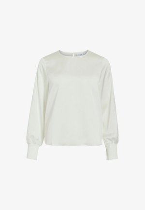 Biała bluzka z długim rękawem, okrągłym dekoltem i marszczonymi mankietami, wyeksponowana na jednolitym białym tle.