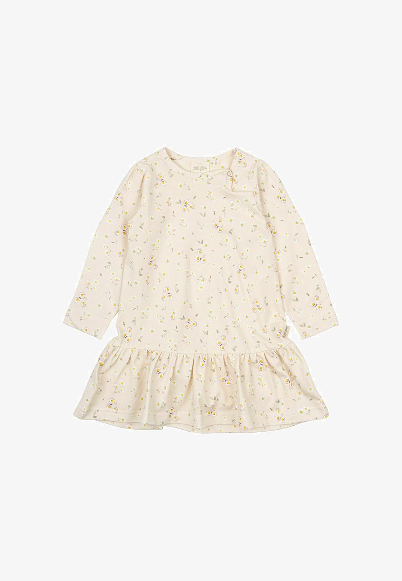 Kombinezon z dolgimi rokavi iz svetlo bež tkanine, ki ima cvetlični potisk v rumeni in vijolični barvi. Rjavljeni rob in mehak, teksturiran material.