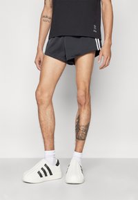 adidas Originals PRIDE TREFOIL - Tréningruha alsók - black