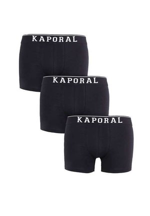 Boxer-briefs en coton noir vendus par pack de trois, avec une ceinture en logo "KAPORAL" blanche et un design ajusté.