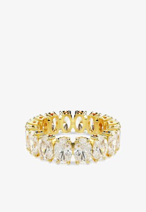 Anello eterne in oro con grandi gemme ovali chiare disposte uniformemente attorno alla fascia.