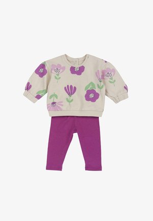 Haut beige à manches longues avec des imprimés floraux violets et roses, assorti à des leggings violets unis pour les tout-petits.