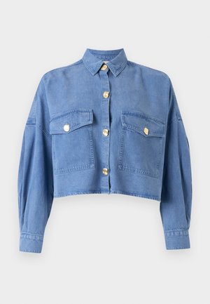 Blue cropped denim jacket with long sleeves, two large front pockets with flaps, and four gold buttons down the center.