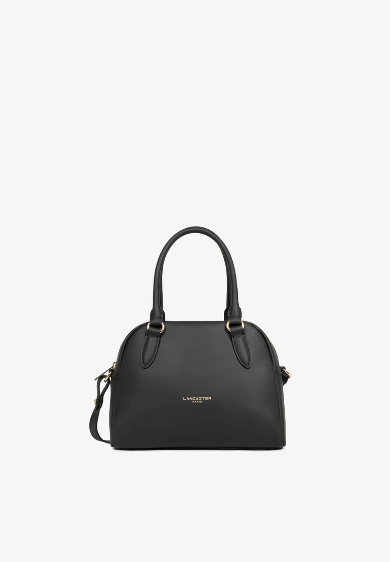 Sac à main noir Lancaster Paris avec deux poignées, ferrures dorées et bandoulière amovible sur fond blanc.