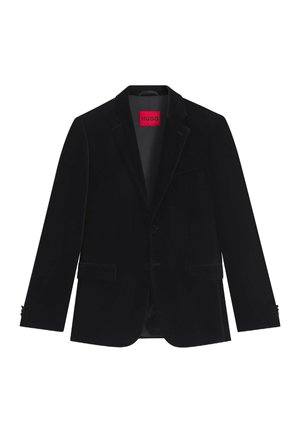 Svart sammet blazer med slagkrage, två framfickor och knäppning. Inuti fodrad med slätt tyg, har HUGO-märkning i rött.