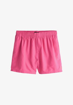 Rózsaszín fürdőnadrág könnyű anyagból, rugalmas derékpánttal és egy kis oldalsó logóval. Simas textúra, mintázat nélkül.