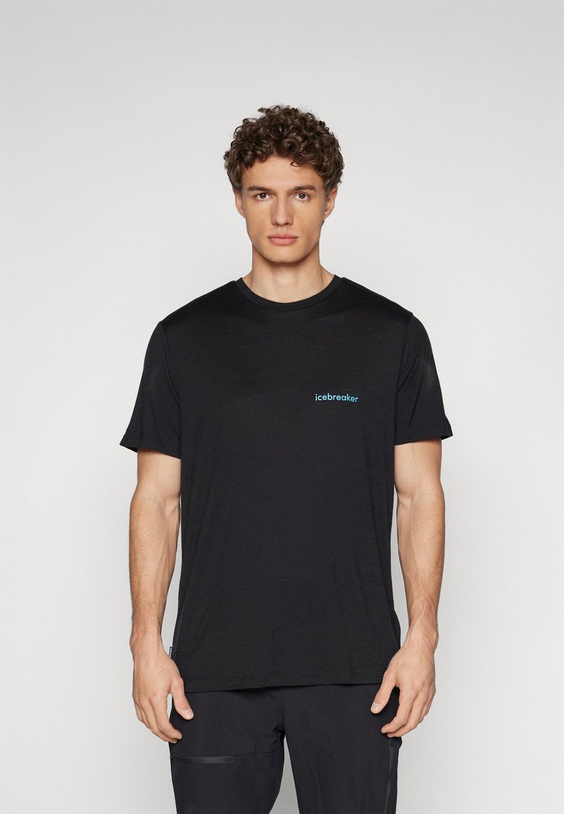 Black crew neck t-shirt made of soft fabric, featuring a small blue "icebreaker" logo on the left side, short sleeves, and a relaxed fit.