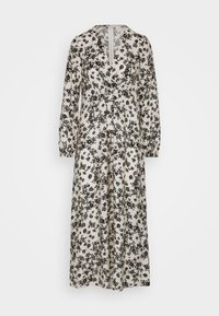 Robe longue à fleurs avec un fond crème, des fleurs noires et des accents verts, décolleté en V et longues manches bouffantes. Fabriquée en tissu léger.