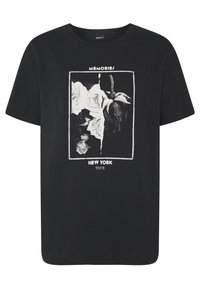 Black cotton t-shirt featuring a graphic print of roses and a torn effect. Text reads "MEMORIES" and "NEW YORK TOUR" in white.