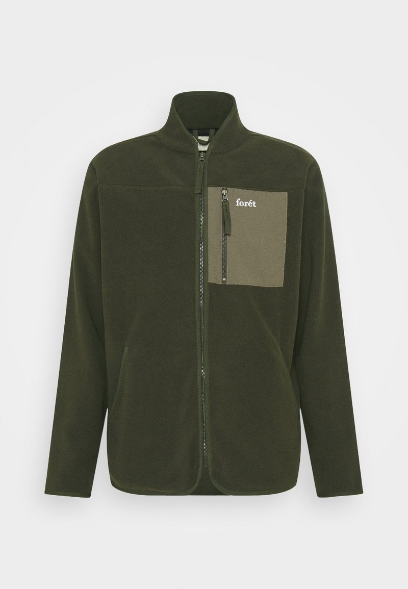 Giacca in pile verde scuro con zip a tutta lunghezza, colletto alto e tasca con zip di contrasto sul lato sinistro, marchiata "forét".