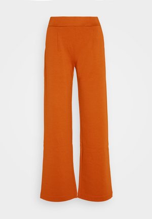Orangenweite Hosen aus einem weichen Stoff, mit einem hohen Bund und zwei vorderen Falten für zusätzlichen Designakzent.