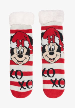 Calze a righe rosse e bianche con un polsino bianco soffice. Presentano un grande viso di Minnie Mouse e il testo "xo" in nero. Tessuto morbido, design casual.