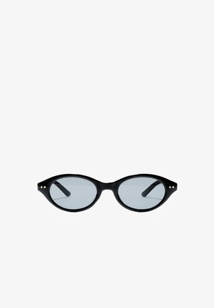 Schwarze ovale Sonnenbrille mit dünnem Gestell und kleinen goldenen Punkten nahe den Scharnieren, mit leicht getönten Gläsern.
