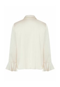 Cream-colored blouse with a smooth satin finish, featuring a collar and ruffled sleeves, designed for a relaxed fit with a straight hem.