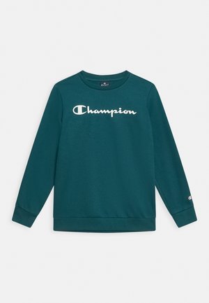 Langärmliges Sweatshirt in Petrol mit weißem "Champion"-Logo auf der Brust und kleinem Logo am linken Handgelenk.