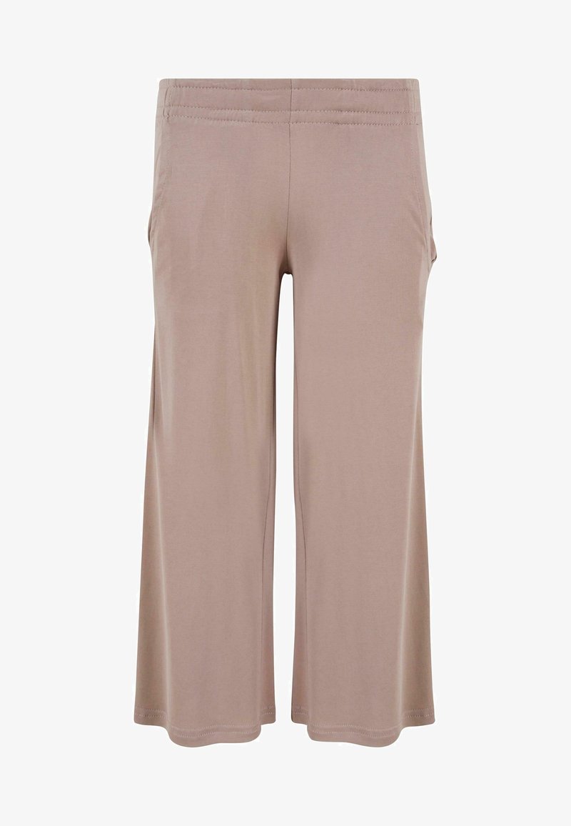 Svetlo hnedé skrátené nohavice vyrobené z mäkkej tkaniny, s širokým strihom, elastickým pásom a bočnými vreckami. Hladká textúra.