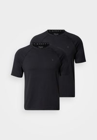 Svarta t-shirts med korta ärmar, med rund halsringning och raglanärmar, tillverkade av lätt tyg med en mjuk struktur. Två-pack.