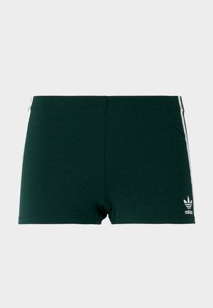 Shorts en coton verts au design ajusté, avec des bandes latérales blanches et un logo Adidas en blanc sur le bas à gauche.