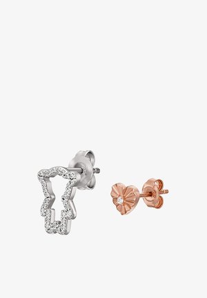 Hopeakuu kankaita muotoiltu korvakoru, johon on koristeltu kirkkailla jalokivillä; ruusukultainen kukkakorvakoru, jossa on keskikiven yksityiskohta.