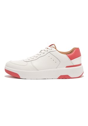 White leather sneaker with pink accents and a brown heel. Features a padded collar, lace-up design, and textured rubber sole.