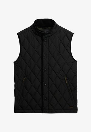 Czarna pikowana kamizelka z wysokim kołnierzem, przednimi zatrzaskami, dwiema kieszeniami na zamek błyskawiczny i subtelnym logo na piersi. Miękka tekstura.