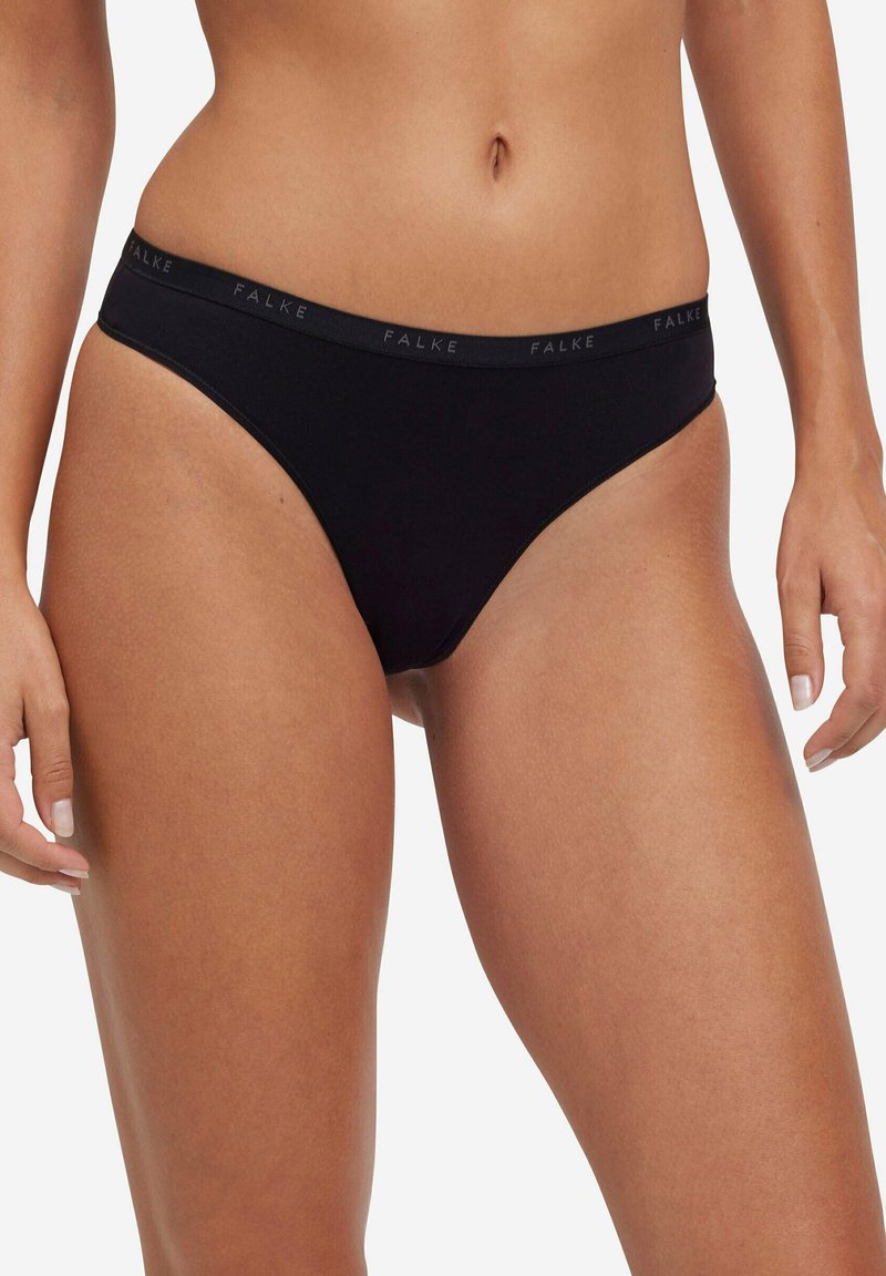 Zwarte bikini slip met een platte tailleband waarop het merk "FALKE" in grijs is gedrukt. Gemaakt van zachte, rekbare stof voor comfort.