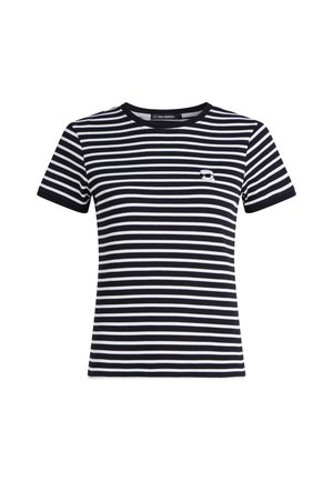 Black and white horizontal striped short-sleeve shirt with small embroidered face wearing sunglasses on left chest.