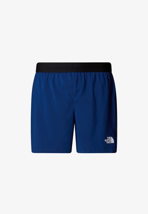 Bañador azul marino con cintura elástica negra, con un logo blanco en la parte inferior izquierda. Textura ligera y suave.