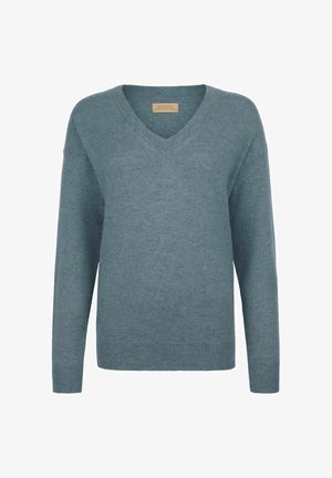 Pull en cachemire bleu clair avec un décolleté en V, des manches longues et des poignets côtelés. Texture douce et coupe décontractée, avec un minimum de détails.