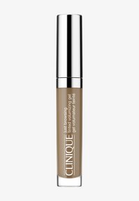 Gel volumizzante colorato Clinique in un tubo trasparente con un tappo argentato. Il prodotto ha una tonalità marrone, adatta per valorizzare le sopracciglia.