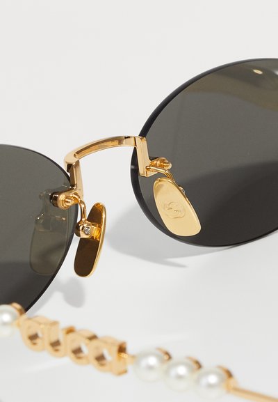 Gucci Sluneční brýle - gold-coloured/grey