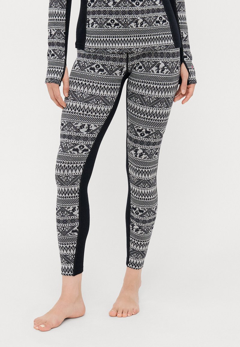 Black and gray patterned leggings featuring intricate geometric designs, soft texture, and a fitted shape with side seam accents.