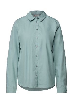 Camicia azzurro chiaro a maniche lunghe, con bottoni, realizzata in tessuto morbido. Presenta un colletto, orlo arrotondato e dettagli con bottoni sulla parte anteriore e sulle maniche.