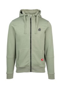 Hooded zip-up sweatshirt in gedempt groen katoenmix. Voorzien van voorzakken, ribgebreide manchetten en een zwart logo-accent op de borst.