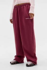 HARRI BAGGY JOGGER UNISEX - Tracksuit bottoms - maroon