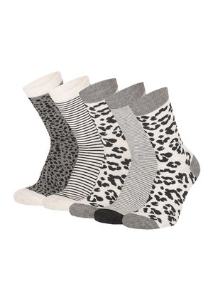 Fünf Paar knielange Socken in Grau-, Weiß- und Schwarztönen mit Mustern wie Leoparden-, schmalen Streifen und dünnen Linien.