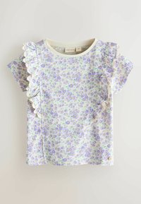 Lányok rövid ujjú felsője lila margaréta virágmintával és fodros részletekkel az elején és a vállakon, krémszínű nyakrésszel, valamint kis márkajelzéssel a szegély közelében.