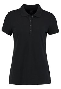Polo noir en coton, avec un col classique, des manches courtes et une patte de boutonnage à trois boutons. Texture lisse.